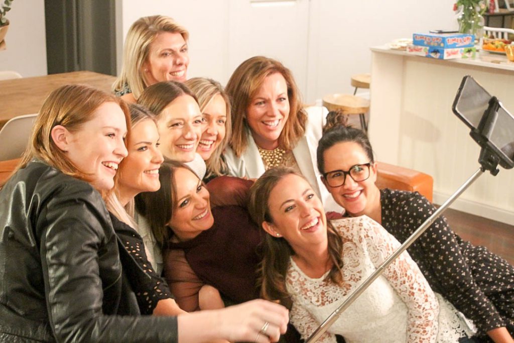 Women taking a selfie and having fun at their Girls' Night In
